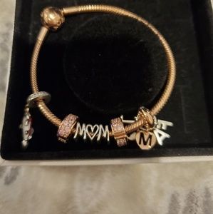 Pandora 7.5 Rose Gold Bracelet with charms
